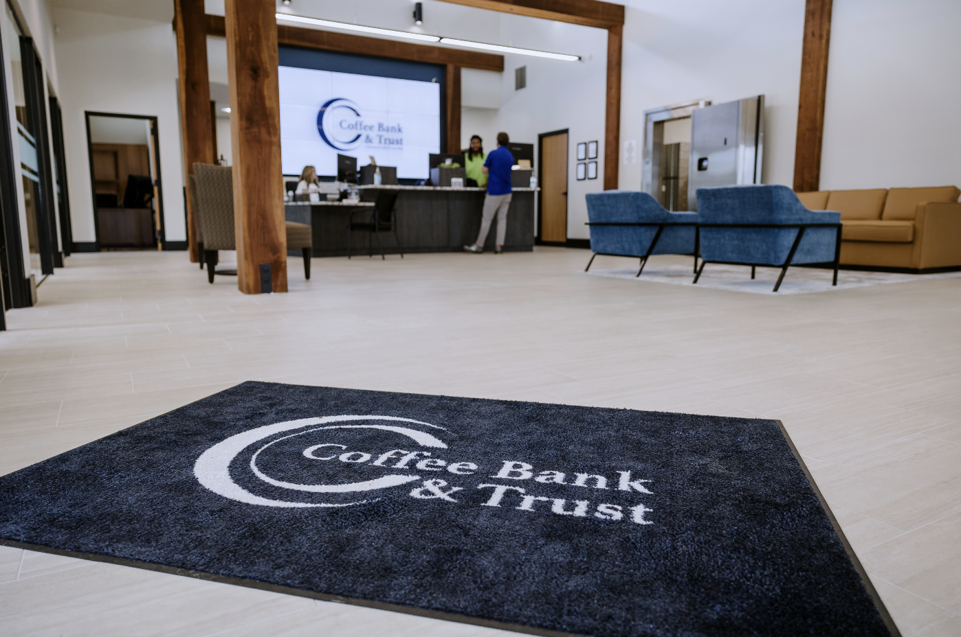 Coffee Bank & Trust-branded rug in the lobby at McMinnville, Tenn., full-service branch. Coffee Bank & Trust is proud to be a trusted McMinnville bank offering personal and business financial services backed by local decision-making and hometown service. If you're searching for a local bank in McMinnville, our team is here with checking, savings, loans, and community-focused support.