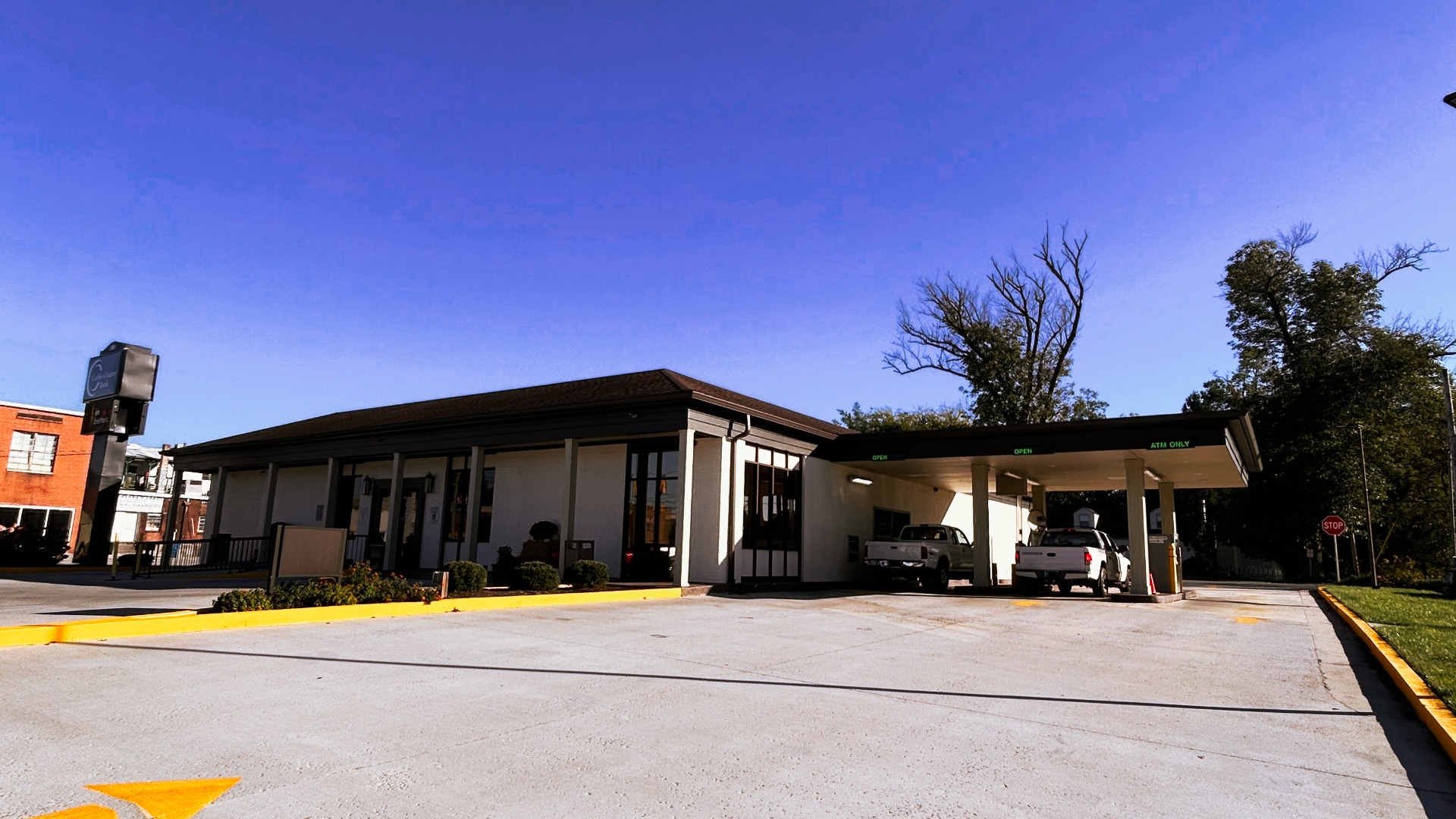 Coffee County Bank in downtown Manchester, Tenn., is pictured. The full-service Manchester bank offers lobby and drive-thru services. Vehicles are serviced in the drive-thru in the image.